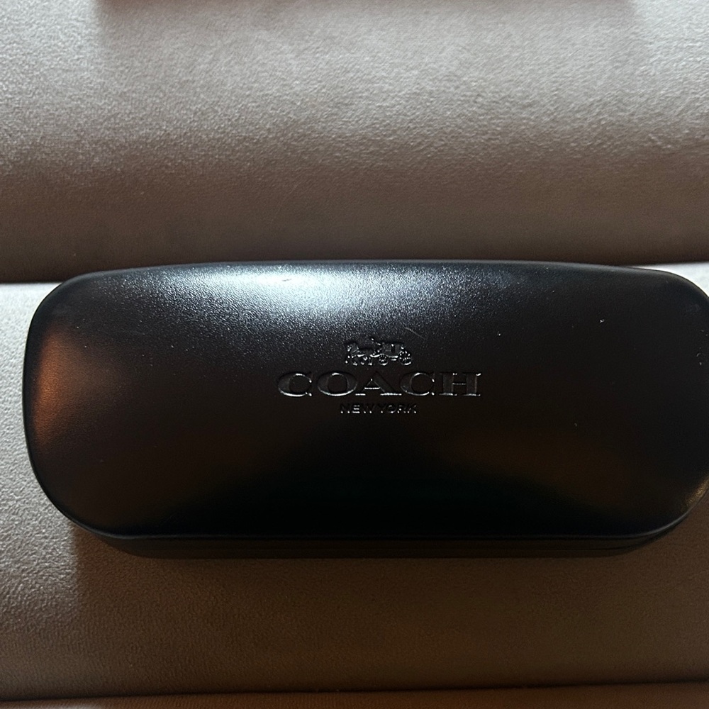 Coach eye glass case.